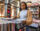 Young woman shopping for records