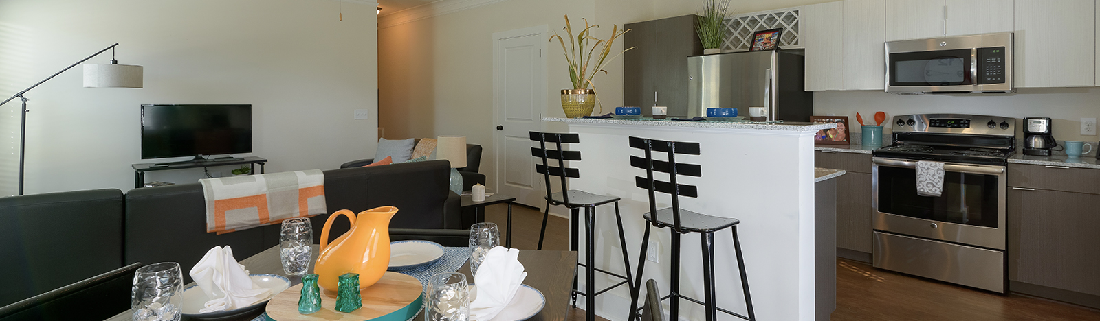 Furnished apartment featuring an open floorplan