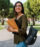 Young woman walking to class